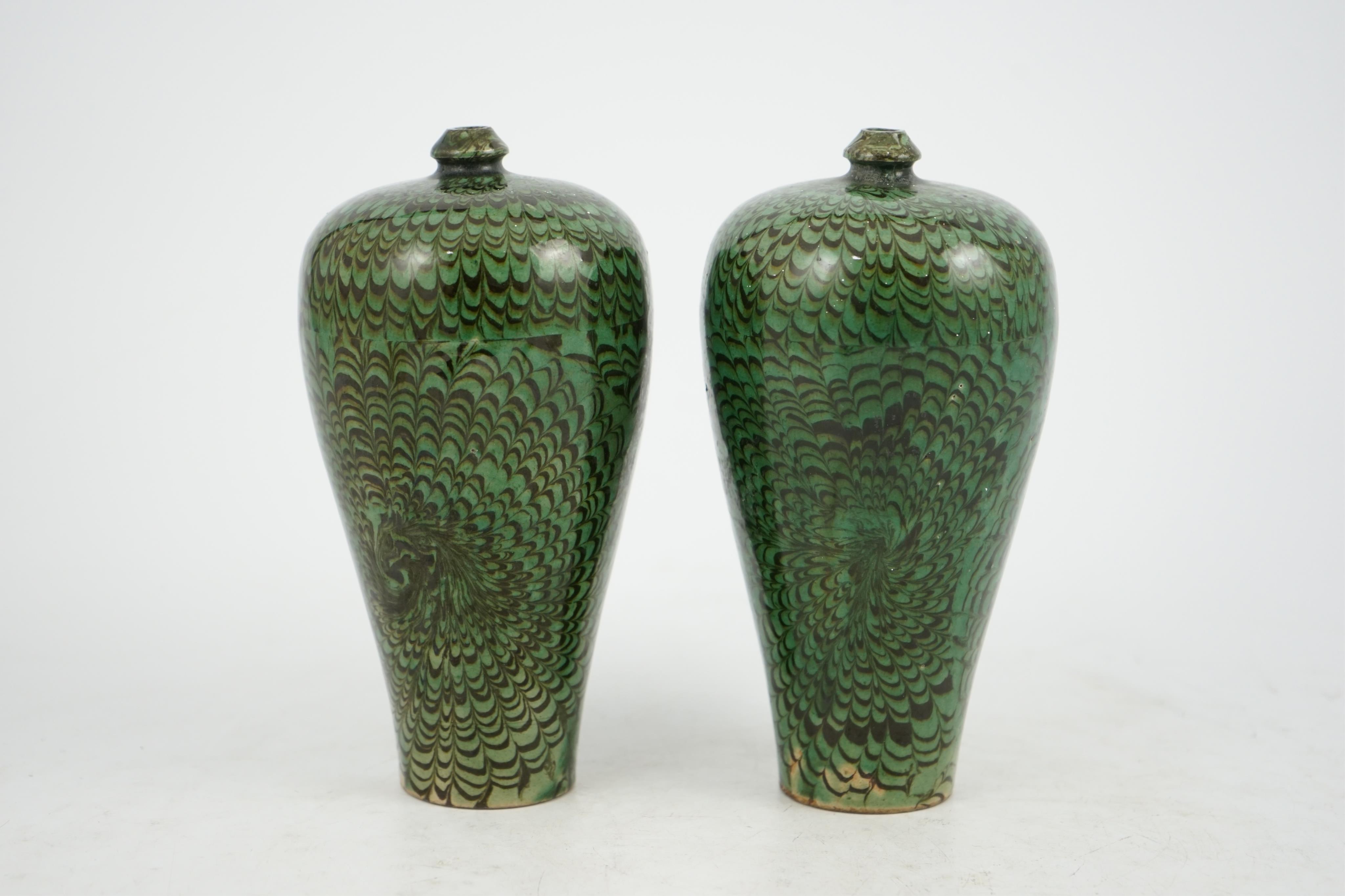 A pair of Chinese Cizhou green glazed meiping, probably Ming dynasty